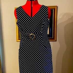 Navy w white. Classic hidden pockets fitted  torso fully lined knee length